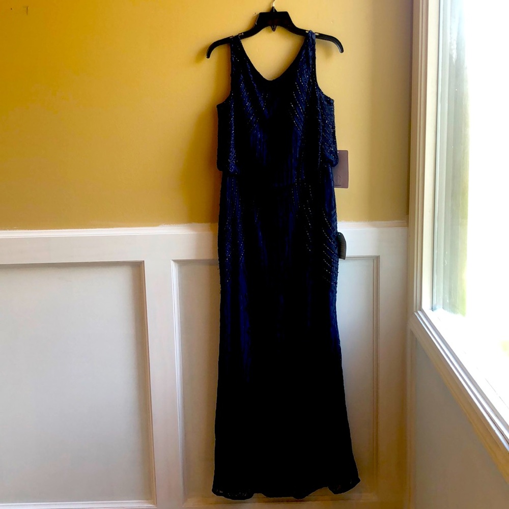 Navy blue beaded evening gown. New with tags.